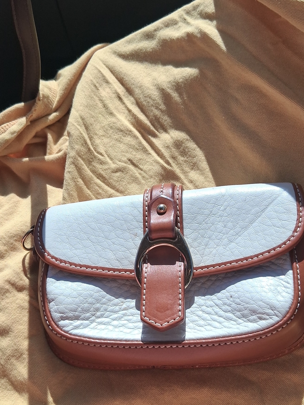 Dooney & Bourke White and Brown Leather  Wristlet